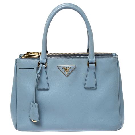 light blue prada bag.